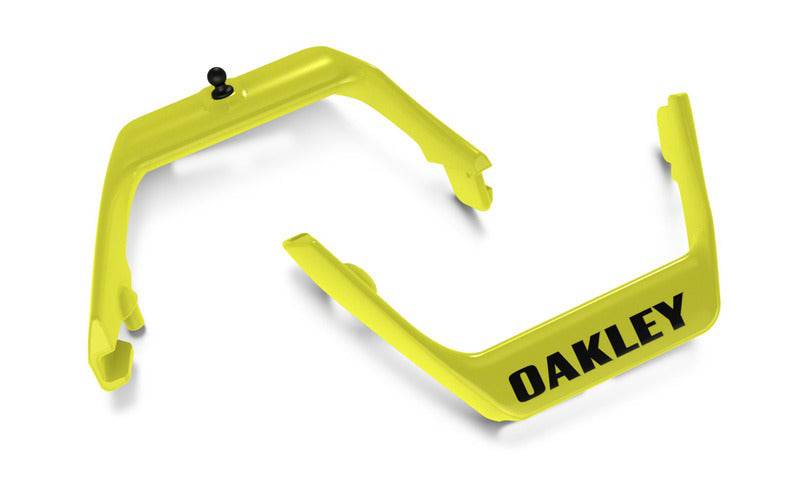Metallgelbe Ersatzteile für OAKLEY Airbrake Brille, Outriggers, sichtbar auf dem Bild.
