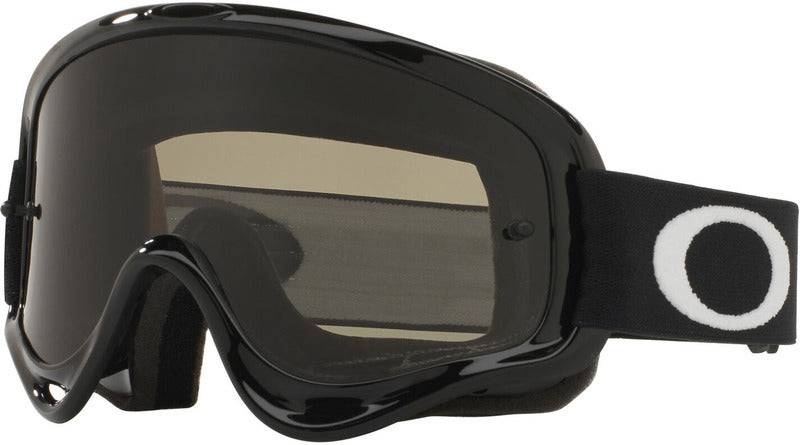 OAKLEY XS O Frame MX Sand Brille in Schwarz mit dunklen Rahmen und klarer Linse für Motocross, leicht und robust.