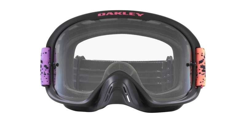 OAKLEY O Frame 2.0 Pro MX-Brille in Schwarz mit Splatter-Design und klarer Linse für Motocross-Sport.