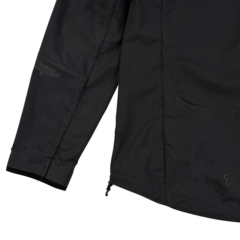 Troy Lee Designs Drift Windbreaker Mono Carbone, schwarze Freizeitjacke mit TROY LEE DESIGNS Logo, winddicht und bequem