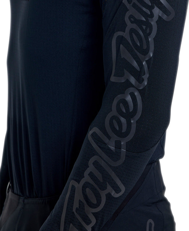 Schwarze Troy Lee Designs MX-Jersey Se Ultra Mono mit Logo und atmungsaktivem Material, für Motocross-Fahrer.