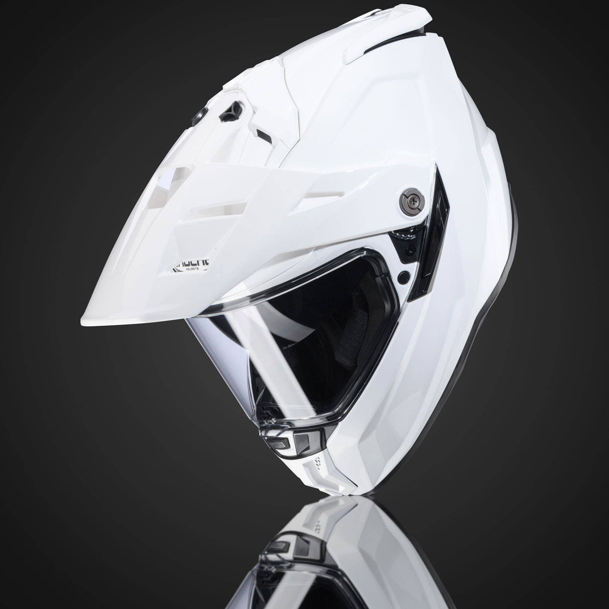 Weißer metallic Endurohelm Caberg Tanami mit klarem Visier und robustem Design, ideal für Offroad-Abenteuer.