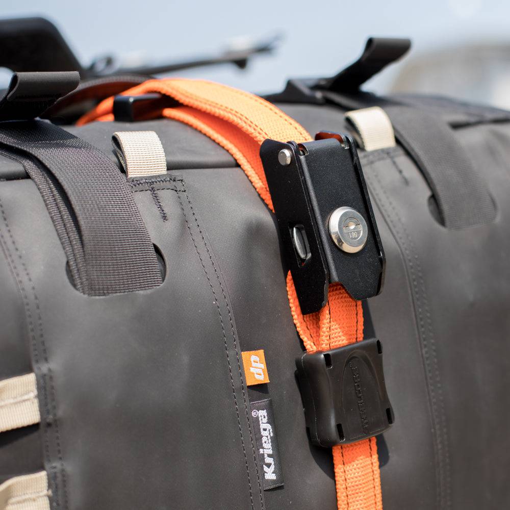 Kriega Sicherheitsgurt Stahlkern in orange, robustes Zubehör-Tasche mit Stahlkern für sichere Befestigung.