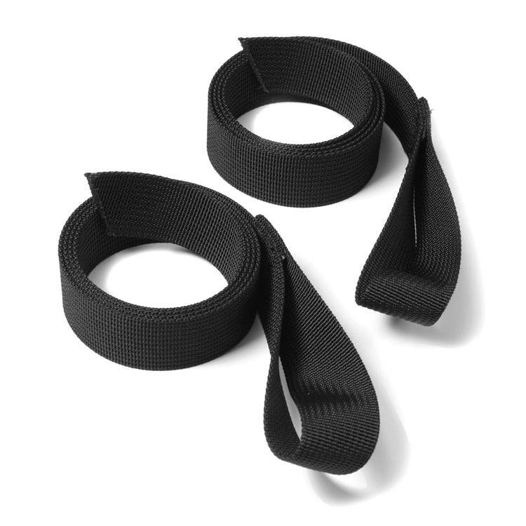 Zwei schwarze Kriega US-Drypack Comp Strap Schlaufengurte, Ersatzteile für robuste Motorrad-Taschen, auf weißem Hintergrund.