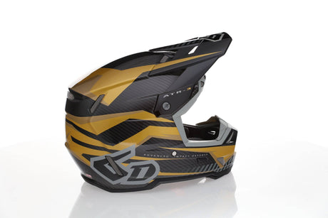 Motocrosshelm 6D ATR-3 Rival Gloss Gold FIM mit schimmernder goldener Oberfläche und sicherem Visier.
