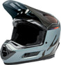 Motocrosshelm iXS Trigger MX 1.0 MIPS in Grau-Schwarz, mit Visier und Belüftungsöffnungen, auf einem schwarzen Hintergrund.