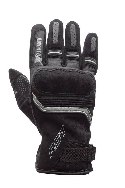Schwarze RST Adventure-X CE Leder Motorradhandschuhe mit robustem Design und Schutzdetails für sicheres Fahren.