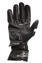 Schwarze und weiße RST Pilot CE Leder Motorradhandschuhe mit Knöchelschutz und strapazierfähigem Material.