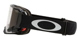 OAKLEY Airbrake MX-Brille mit schwarzen Tuff Blocks, Gunmetal Rahmen und klarer Roll-Off Linse für den Motorsport.