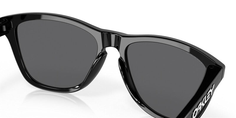 OAKLEY Frogskins Sonnenbrille Schwarz Poliert - Schwarze Gläser