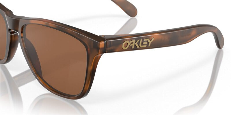 OAKLEY Frogskins Sonnenbrille in mattem Braun mit braunen Gläsern, stilvolle und sportliche Sonnenbrille für Damen und Herren