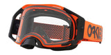 OAKLEY Airbrake MX Brille in Orange mit klaren Glas, für Motocross, zeigt Brille mit orangeem Rahmen und transparentem Glas.