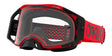 OAKLEY Airbrake MX Brille mit rotem Rahmen und klarem Glas, speziell für Motocross, in action auf einer Moto-Strecke