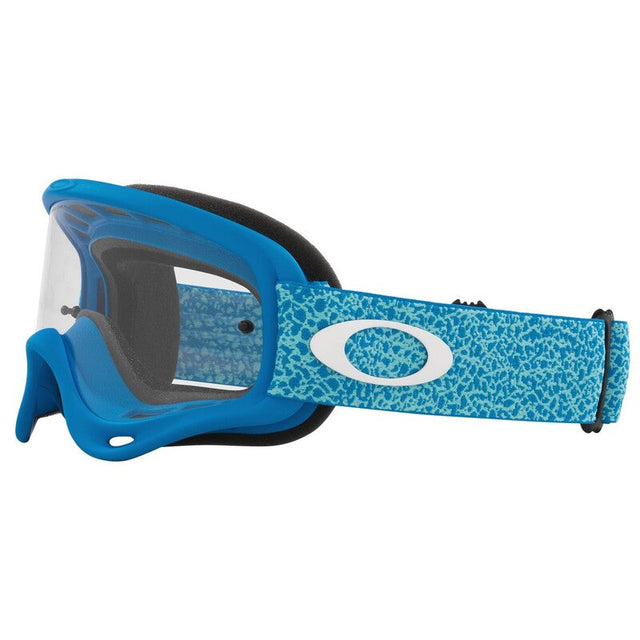 OAKLEY O-Frame MX Brille in Blau mit Crackle-Design und klaren Gläsern, geeignet als Ersatzbrille für den Motorradsport.