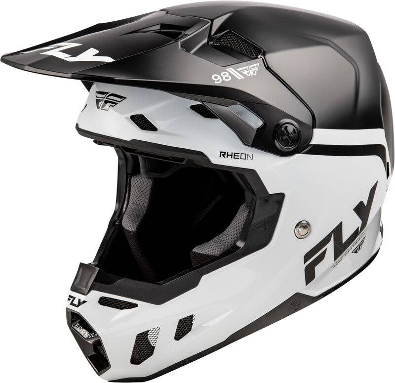Motocrosshelm von FLY RACING, Formel CC Objective in Schwarz und Weiß, mit Belüftungsöffnungen und sicherem Kinnriemen.