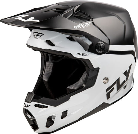 Schwarzer und weißer Fly Racing Formula CC Objective Motocrosshelm mit Visier und Belüftungsöffnungen, leicht und sicher.