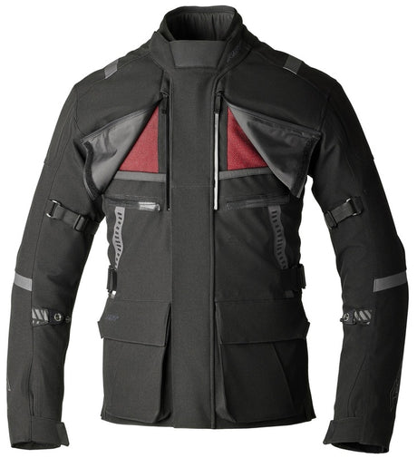 Schwarze RST Pro Series Vulcan CE Textil-Motorradjacke für Adventure, wetterfest und strapazierfähig, auf einem Motorrad.