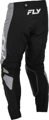 Schwarze und graue Fly Racing Kinetic MX-Hose mit atmungsaktivem Material und robustem Design für Motocross-Fahrer.