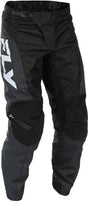Fly Racing F 16 MX-Hose in Schwarz und Weiß mit flexiblen Materialien und Mesh-Einsätzen für optimalen Komfort.