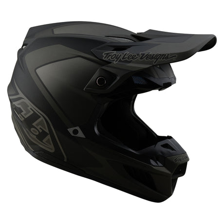 Schwarzer Troy Lee Designs Se5 Composite Mono Motocrosshelm mit Visier und Belüftung, Schutz und sportliches Design.