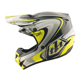 Motocrosshelm von Troy Lee Designs GP Pro Crossover in Grau und Gelb, mit Schutzvisier und Belüftung, auf weißem Hintergrund