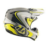 Motocrosshelm Troy Lee Designs GP Pro Crossover in Grau und Gelb, with robust Schutzschale und Belüftungssystem.