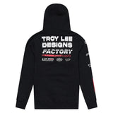 Schwarze Freizeitbekleidung von TROY LEE DESIGNS, sportlich und bequem, mit markantem Design, auf einem Model getragen.
