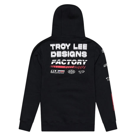 Schwarze Freizeitbekleidung von TROY LEE DESIGNS, sportlich und bequem, mit markantem Design, auf einem Model getragen.