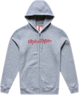Grauer TROY LEE DESIGNS Zip-up Signature Hoodie aus Freizeitbekleidung, mit grauem, heather und roten Details sichtbar.