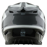 Motocrosshelm von TROY LEE DESIGNS in Grau und Weiß mit robustem Design und Visier, für Cross-Fahrer geeignet
