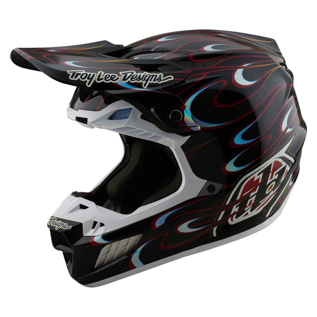 Motocrosshelm Troy Lee Designs SE5 Carbon Torched in Schwarz und Rot mit belüftetem Design und visier.