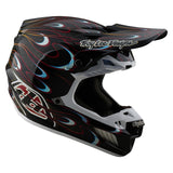 Motocrosshelm TROY LEE DESIGNS Se5 Carbon Torched in Schwarz und Rot mit sichtbarem Visier und Belüftung.