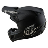 Schwarzer Troy Lee Designs Se5 Carbon Mono Motocrosshelm mit Visier und Belüftungsöffnungen, hochwertiger Schutz für Offroad-Fahrer