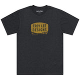 Schwarzes Troy Lee Designs Stamp T-Shirt aus Freizeitbekleidung, mit auffälligem Logo-Design auf der Vorderseite.