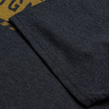 Schwarzes TROY LEE DESIGNS Stamp T-Shirt, Freizeitbekleidung, auf einem modell getragen, mit auffälligem Druck auf der Vorderseite