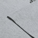 Graues, meliertes Troy Lee Designs Signature T-Shirt aus Freizeitbekleidung, bequemes Unisex-Top mit Logo-Print.
