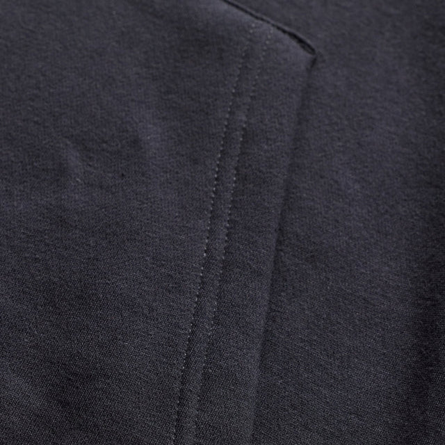 Troy Lee Designs Peace Out Hoodie in Carbon und Schwarz, bequeme Freizeitbekleidung mit stylischem Logo-Design.
