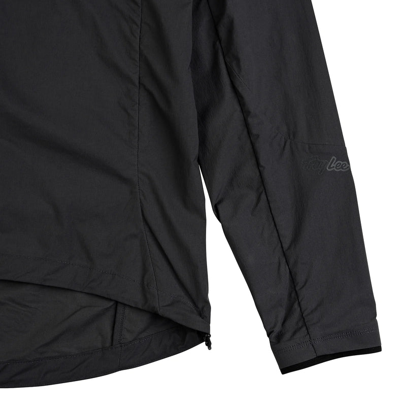 Troy Lee Designs Drift Windbreaker Mono Carbone, schwarze Freizeitjacke mit Logo, winddicht und sportlich für Damen und Herren