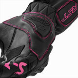 Schwarze und rosafarbene Damen-Motorradhandschuhe von RST, bequem und schützend für den Motorradsport.