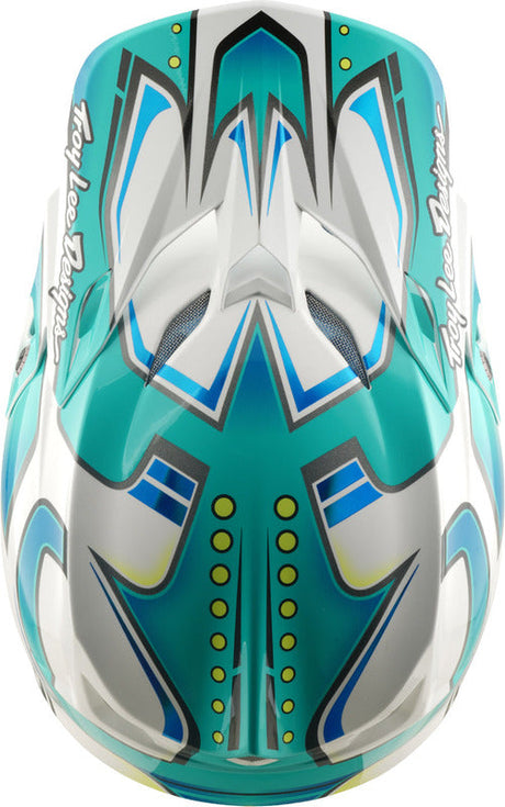 Motocrosshelm Troy Lee Designs Se5 Composite Mips Crest Real Petrol mit hellem Design und verbesserten Schutz, sichtbar auf dem Bild