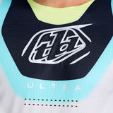 MX-Jersey von TROY LEE DESIGNS, Se Ultra Vision Stone in Weiß und Carbon, mit sportlichem Design und atmungsaktivem Material