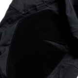 Troy Lee Designs Se Ultra MX-Hose Mono Schwarz, schwarze motocross-Hose mit schützenden Details, auf einem weißen Hintergrund.