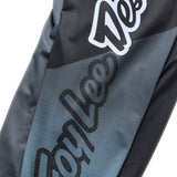 Troy Lee Designs MX-Jersey Se Pro in Schwarz und Grau mit sportlichem Design und atmungsaktivem Material.