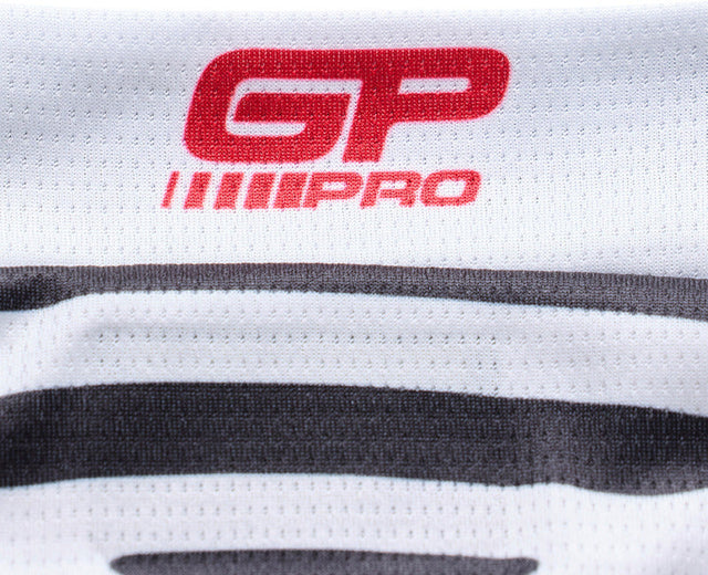 Motorrad-Motocross-Jersey von TROY LEE DESIGNS GP Pro Streamline in Rot und Schwarz, mit sportlichem Design und atmungsaktivem Material.