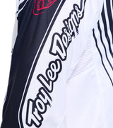 Troy Lee Designs GP Pro MX-Jersey Streamline in Schwarz und Weiß, mit atmungsaktivem Stoff und sportlichem Design.