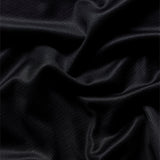 Troy Lee Designs GP Pro MX-Jersey Cyclops in Schwarz, atmungsaktive Motorradjersy mit sportlichem Design, Front- und Rückenansicht