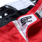 Troy Lee Designs GP Pro MX-Hose Streamline in Rot und Schwarz, langlebige Motorradhose mit ergonomischem Design.