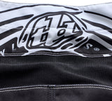 Motorrad-Motocross-Hose Troy Lee Designs GP Pro Streamline in Schwarz und Weiß, langlebiges MX-Hose für sportlichen Schutz