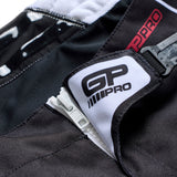 Motorrad-Motocross-Hose von Troy Lee Designs GP Pro Streamline in Schwarz und Weiß, strapazierfähiges MX-Design.