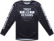 Troy Lee Designs GP Pro Air MX-Jersey Seal Schwarz, atmungsaktive schwarze Motocross-Jacke mit TROY LEE DESIGNS Logo.